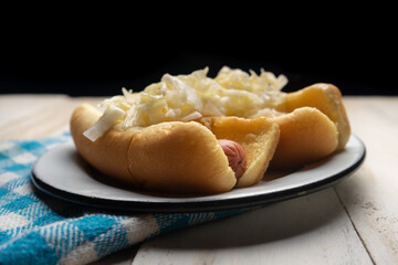Montreal hot dog with cabbage on white background