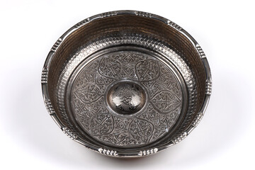 Old vintage copper bath bowl handmade with oriental ornaments isolated over white background.