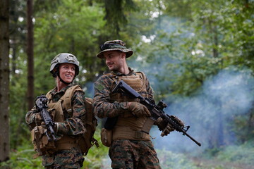 Fototapeta premium Soldier Woman as a Team Leader