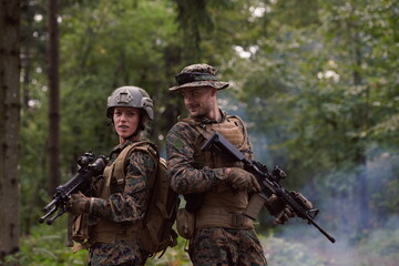 Fototapeta premium Soldier Woman as a Team Leader