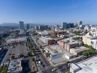 Aerial city view drone photo toward Downtown LA Los Angeles from Western Ave and 8th St around Koreatown Plaza Market