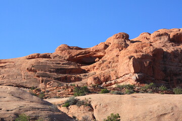 Fototapeta premium Rocks in wild landscape in Arches National Park, Utah, USA, United States, America.
