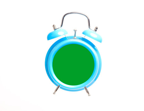 Levitation picture of alarm clock with green chroma key. For time management and graphic concept.