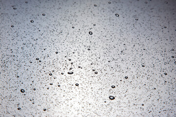 small drops of water on a plastic surface. texture and abstract background