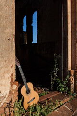 Classical acoustic guitar in ruins of abandoned church at Palmital/ SP - Brazil