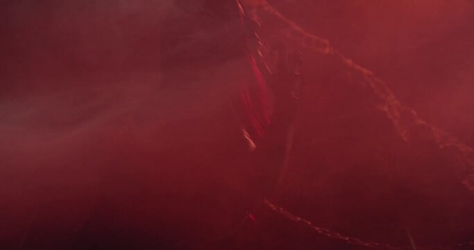 Dark red lighting, scary succubus is luring in the smoke, hell, horror movie, 4k