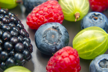 lots of fresh different berries. useful vitamin healthy food fruit. healthy vegetable breakfast