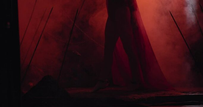 Succubus is walking around in red smoke, horror film, long horns, 4k