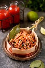 Sea shrimp with soy sauce, garlic, parsley and lime slices. Healthly food. 