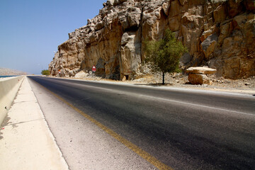 Road near to the Sea & mountain of Oman in a beautiful evening