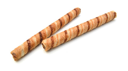 Wafer roll with chocolate and cocoa coating on a white background