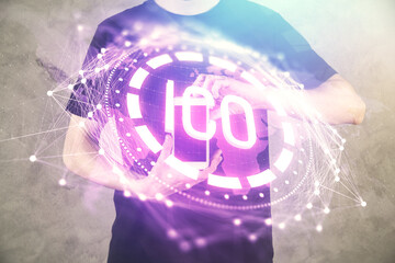 Double exposure of man's hands holding and using a phone and crypto currency blockchain theme drawing.