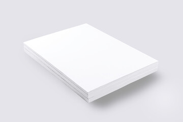 Stack of white blank magazines on gray backgrouns.