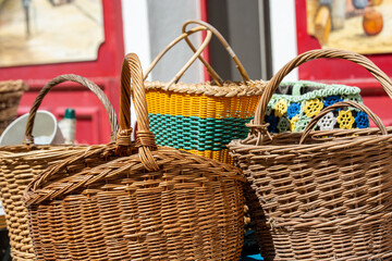 old wicker baskets items for sale at a village flea market