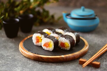 Rolls with salmon and omelet. Healthy japanese food.
