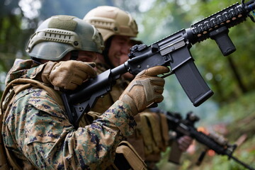 military squad in action rescue wounded soldier