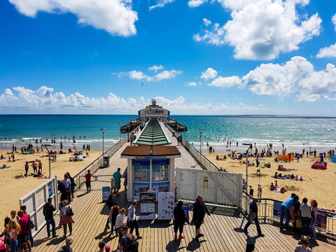 People on the pier at Bournemouth Beach in England