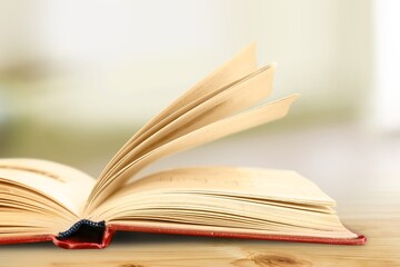 Open book on the wooden desk. Education concept