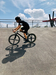 Cycling in a velodrome (sequence shot)