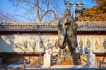 Fototapeta na wymiar Statue of Confucius at the Temple of Confucius, the second largest Confucian Temple in China, it's the place where people paid homage to Confucius during the Yuan, Ming and Qing Dynasty