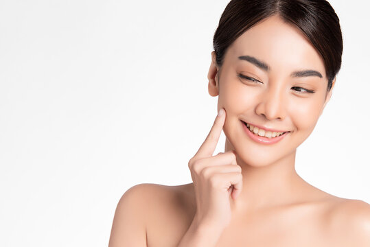 Beautiful Young asian Woman with Clean Fresh Skin, on white background, Face care, Facial treatment, Cosmetology, beauty and spa, Asian women portrait