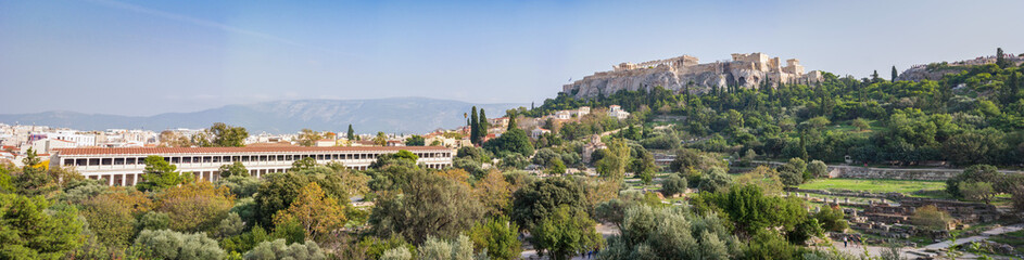 Fototapeta na wymiar View from Ancient Athenian Agora, panoramic view of the Stoa of Attalos and the Acropolis of Athens, essence of Athens