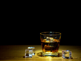 Low light photography of whiskey drinking concept