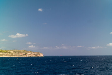 Comino island coast from the sea in malta