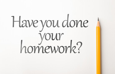 Pencil and phrase HAVE YOU DONE YOUR HOMEWORK? on white background, top view