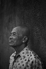 portrait of asian old man with bald head