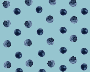 Many fresh blueberries on light blue background. Pattern design
