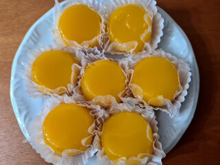 Quindim is a sweet with the ingredients of egg yolk, sugar and grated coconut. They are delicious...