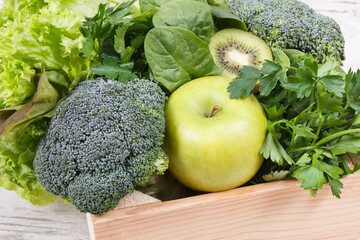 Fresh ripe green fruits with vegetables as healthy food containing vitamins or minerals. Body detox