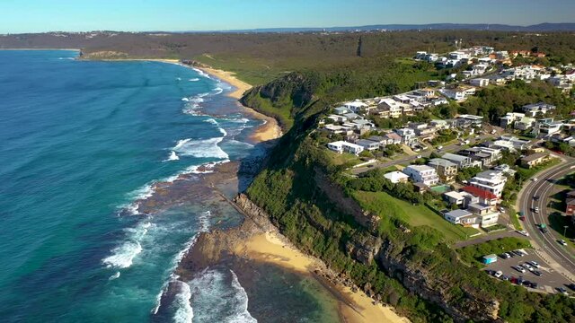 Lowering drone shot of Merewether, New South Wales