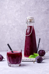 Red plum juice in glass