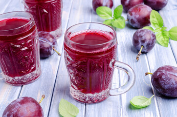 Red plum juice in glass