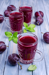 Red plum juice in glass