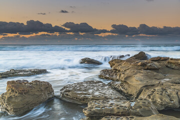 Sunrise Seascape with a low cloud bank