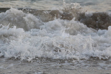 Water flowing on the beach