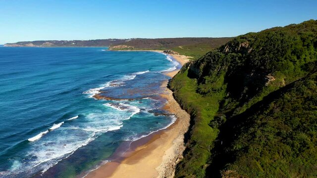 Drone shot of cliffs and ocean, Merewether, New South Wales