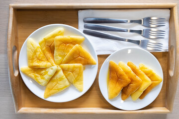 Snack set, pancakes with honey topped with serving tray.