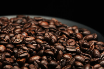 Roasted coffee beans background, Close Up mixture of different kinds of coffee beans.
