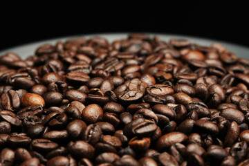 Roasted coffee beans background, Close Up mixture of different kinds of coffee beans.
