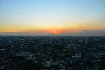 Naklejka na ściany i meble Quezon city overview during afternoon sunset in Quezon City, Philippines