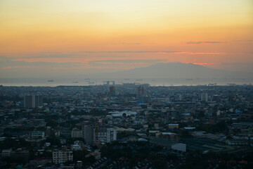 Naklejka na ściany i meble Quezon city overview during afternoon sunset in Quezon City, Philippines