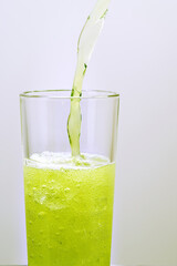 Glass with a fruit drink.