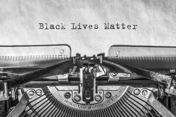 Black lives matter modern logo, banner, design concept, sign, with black and white text on a flat black background.