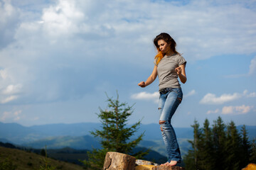 girl posing and gesturing in the mountains