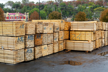 Industrial products, raw materials, timber and sheet steel mill in the industrial port quay shopping ready for loading cargo seagoing vessels