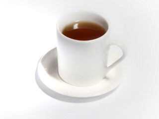 White cup with coffee tea on white
saucer on a white background